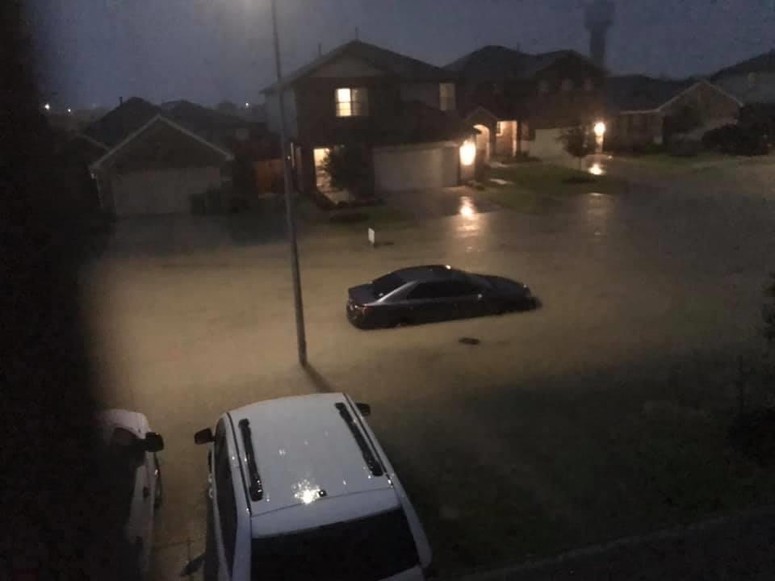 street flooding up to houses