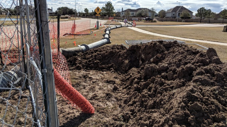 A bypass line was installed to ensure residents saw no interruption in sewer services while repairs to the manhole and sewer line were completed. 